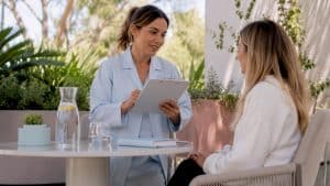 Clinician reviewing patient skin health records