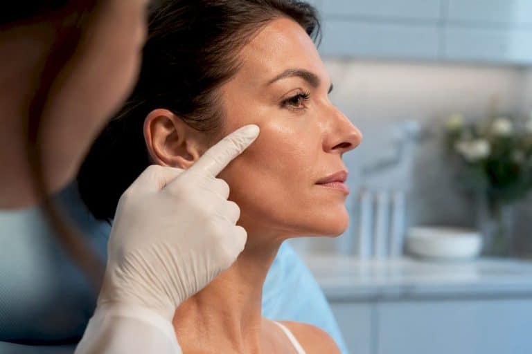 Clinician mapping cheekbone facial landmarks